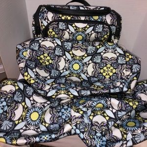 Vera Bradley daisy 4pc bathroom utilities bags. One tote and 3 mesh bags.